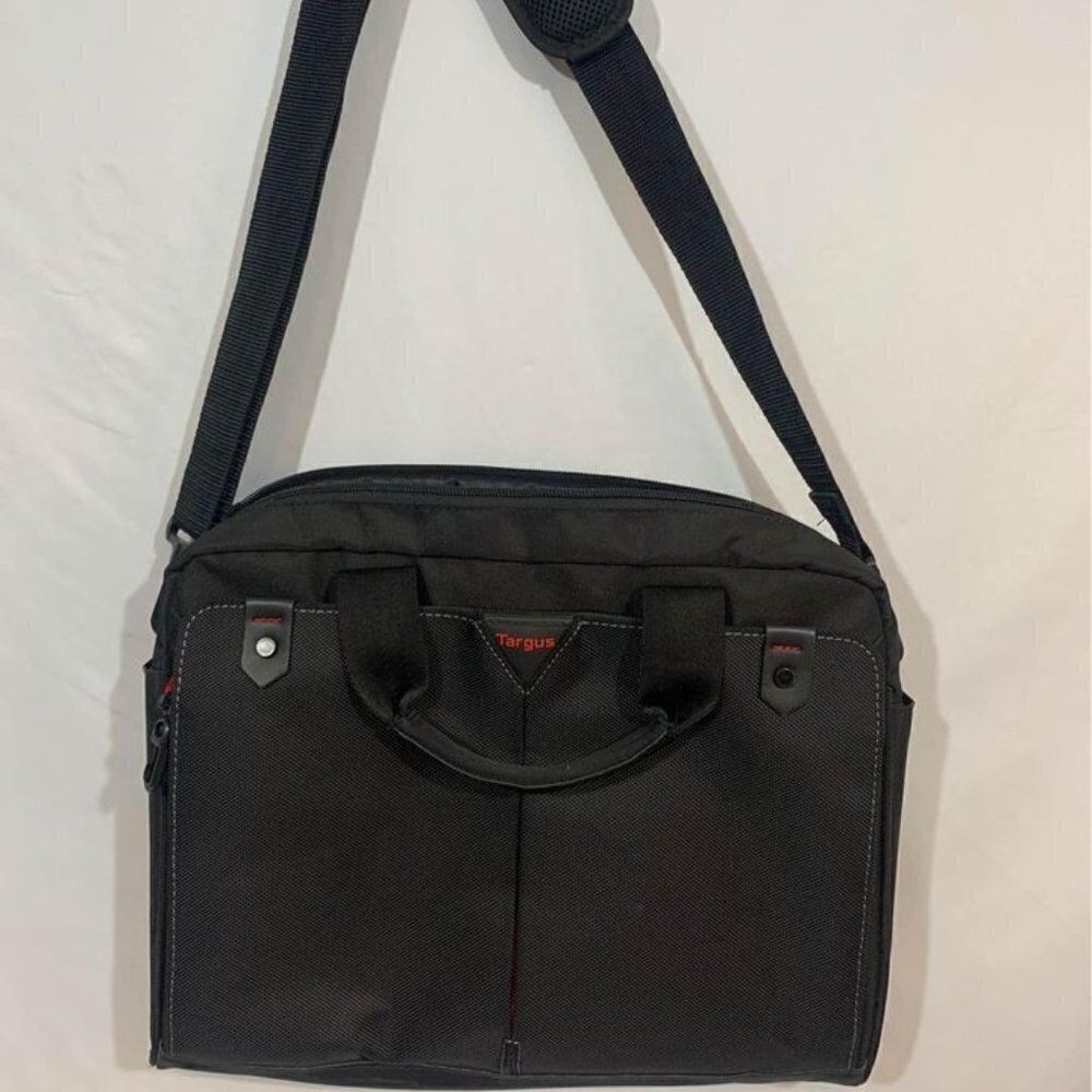 𝅺targus computer bag. Leather accents. Brand new never used. Red details.